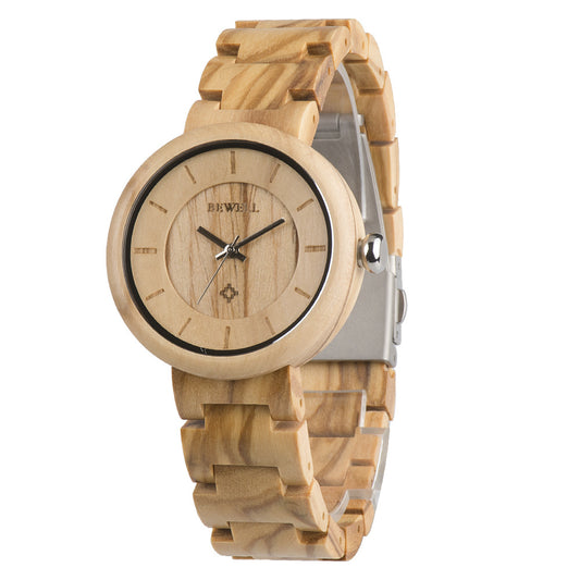 Wooden watch with a clear acrylic back on a white background