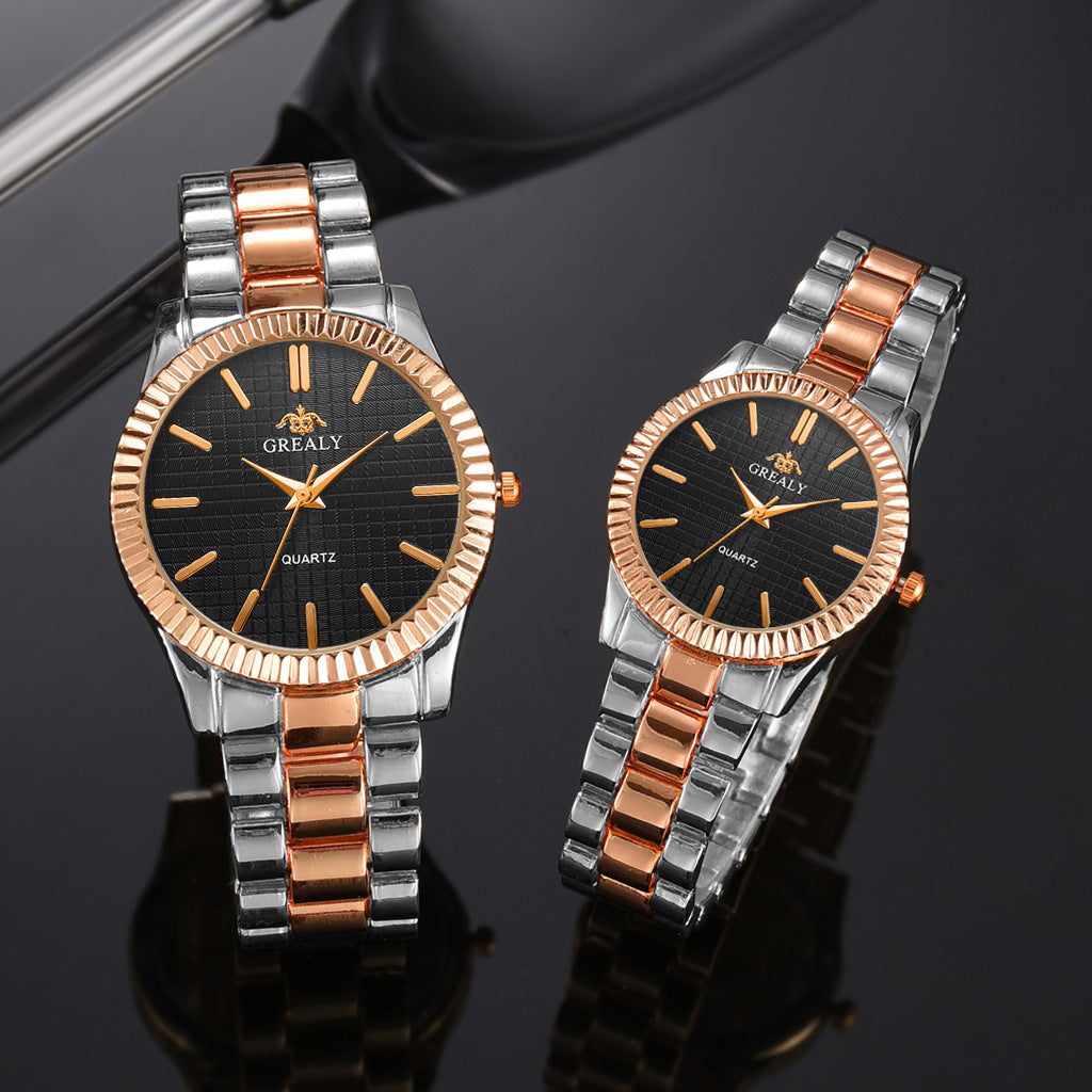 Two Grealy watches with rose gold and silver straps on a reflective black surface