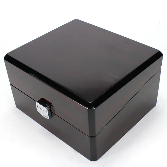 Black jewelry box with a silver clasp on a white background