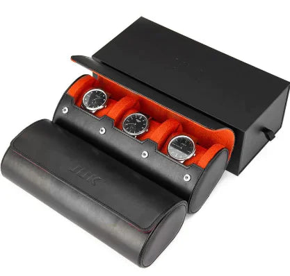 Black watch case with three watches inside on a white background