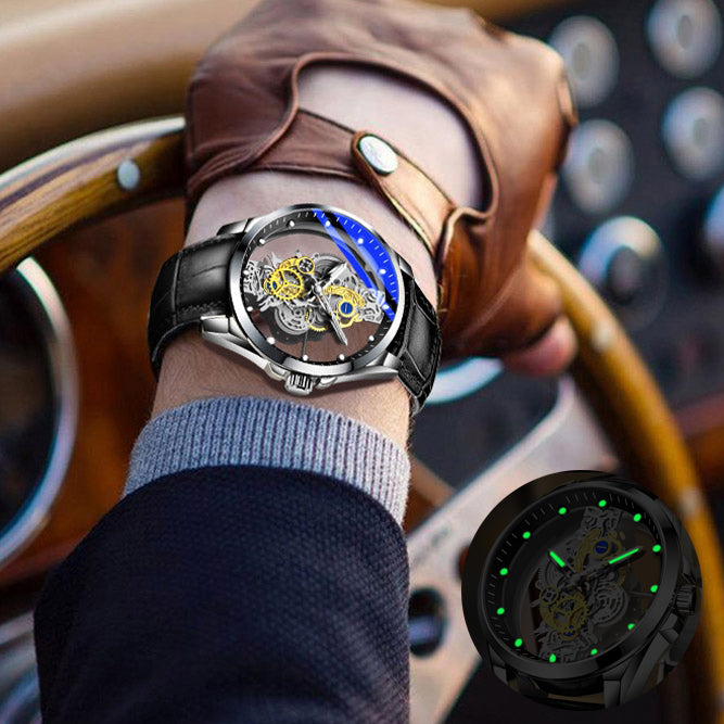 Person wearing a black wristwatch with a visible mechanical movement, sitting in a vintage car.