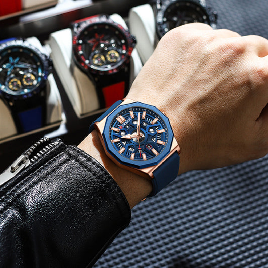 Person wearing a blue and rose gold watch with watches in the background