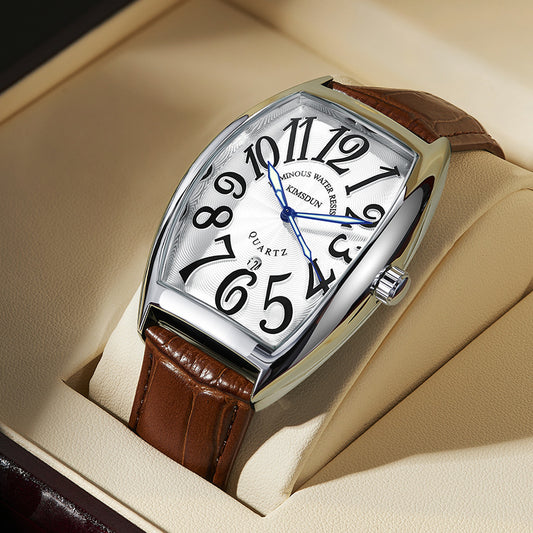 Watch with brown leather strap and silver case on beige background