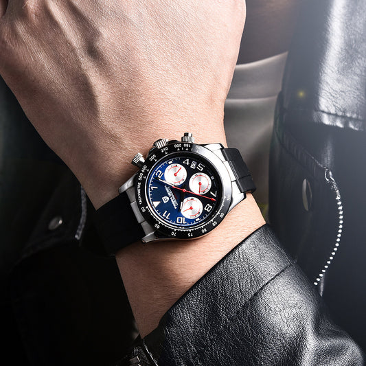 Close-up of a wrist wearing a stylish watch with a black strap and blue face.